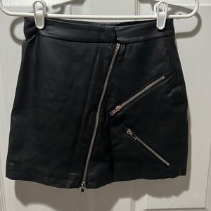 Black leather mini skirt